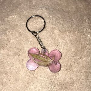 Custom epoxy mini bone 🦴 keychain with my favorite leaf and one wish